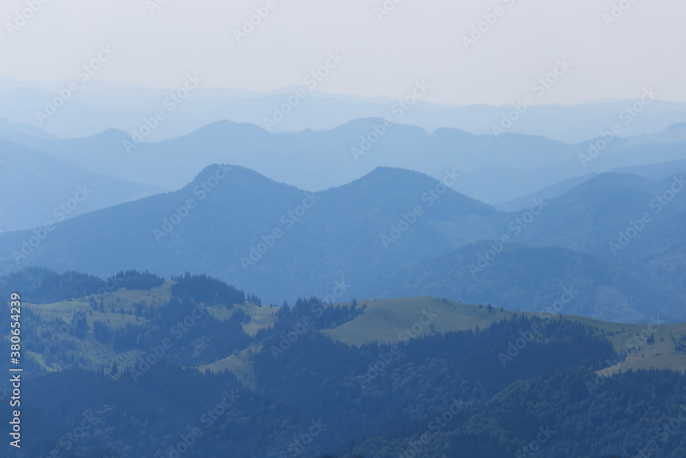 mountain ridge in a blue mist, natural travel background