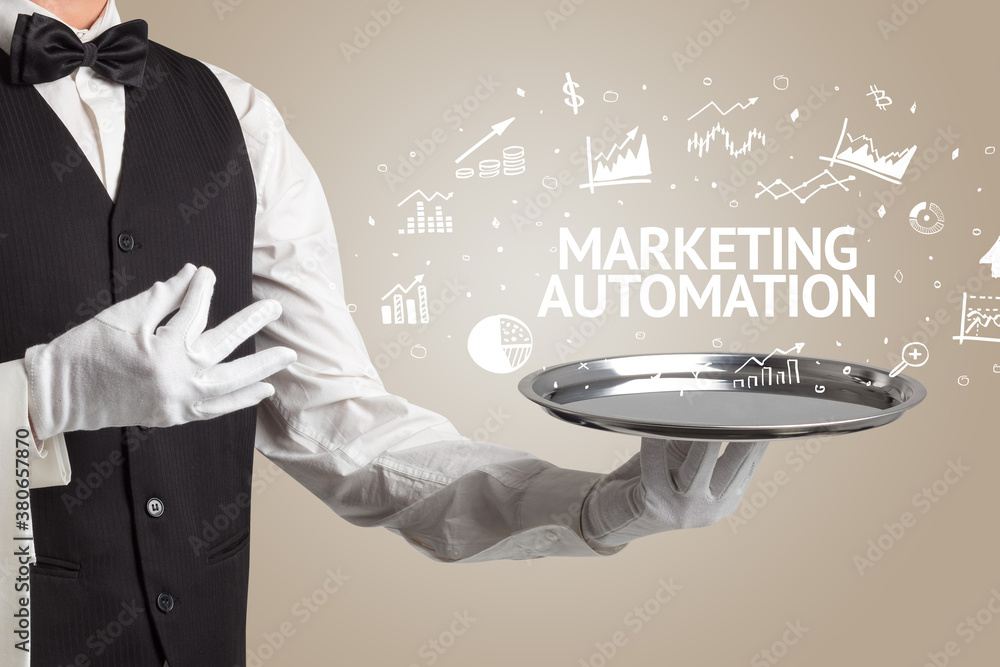 Waiter serving business idea concept with MARKETING AUTOMATION inscription Waiter serving business idea concept with MARKETING AUTOMATION inscription