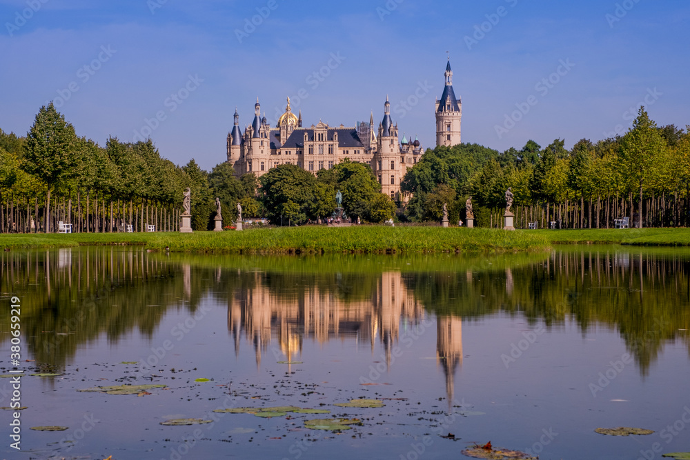Beautiful fairytale castle in Schwerin on a summer day Beautiful fairytale castle in Schwerin on a summer day