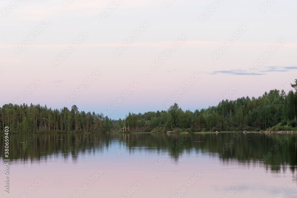 Fototapeta premium Arctic Camp Jokkmokk. Sunset over Lilla Luleälven.