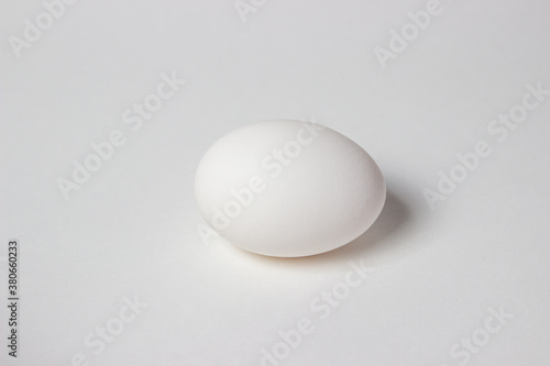 Egg on a white background. White chicken egg