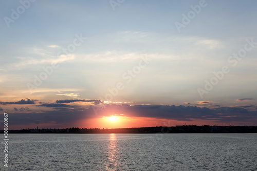 Fototapeta Naklejka Na Ścianę i Meble -  Picturesque view of beautiful sunrise on riverside. Morning sky