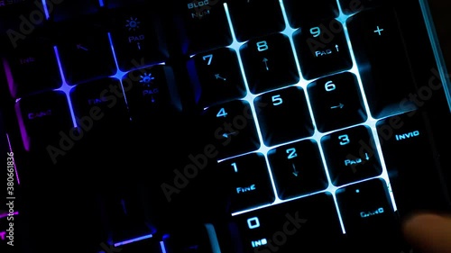 Digiting in backlit numeric keypad photo