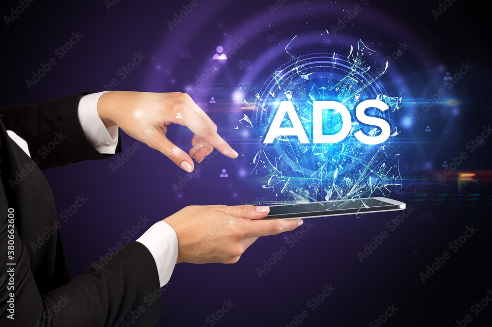 Close-up of a touchscreen with ADS abbreviation, modern technology concept Close-up of a touchscreen with ADS abbreviation, modern technology concept