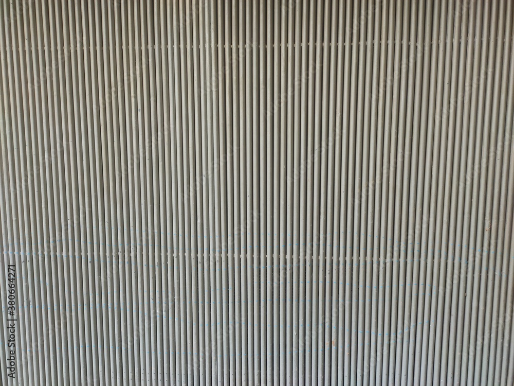 White color aluminium metal plate Siding. Seamless surface of galvanize steel. Industrial building wall made of corrugated metal sheet, flat background photo texture White color aluminium metal plate Siding. Seamless surface of galvanize steel. Industrial building wall made of corrugated metal sheet, flat background photo texture