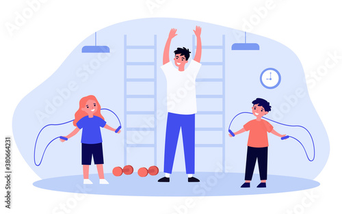 Smiling kids training in gym with trainer. Skipping rope, exercise, jumping flat vector illustration. Health and sport activity concept for banner, website design or landing web page