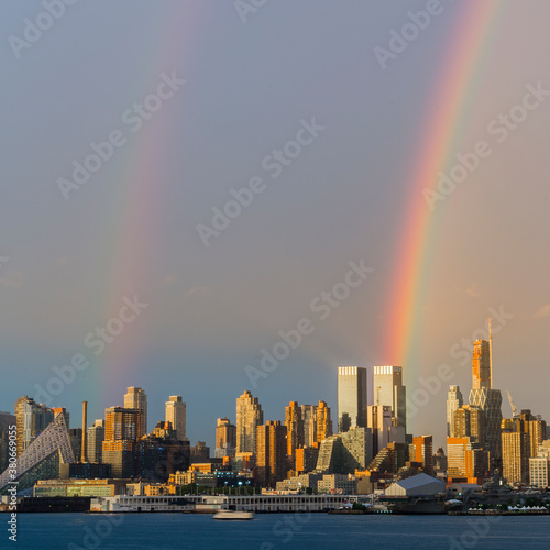Rainbow at the golden hour above the city