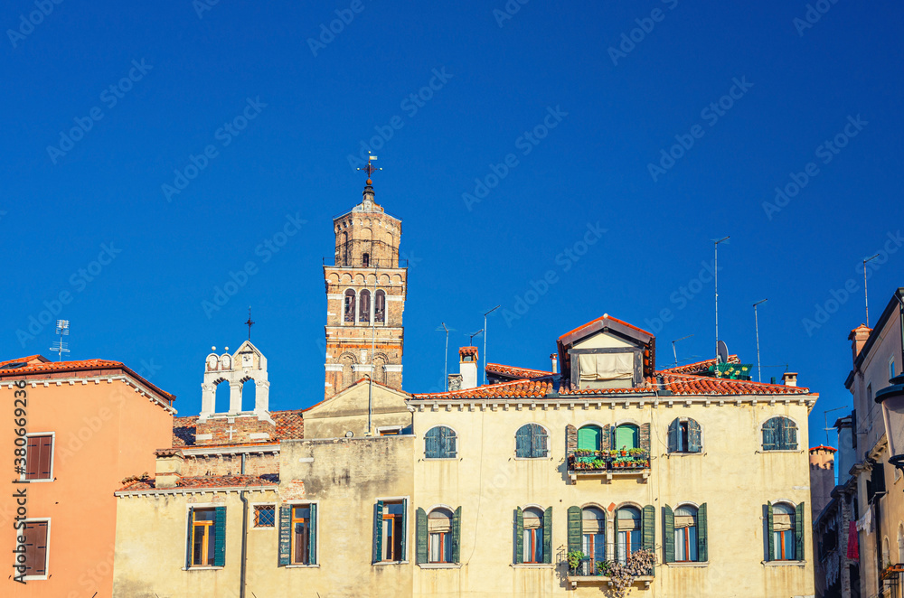 Campo Santo Stefano square with typical italian buildings of Venetian architecture and Santo Stefano Bell Tower in Venice historical city centre San Marco sestiere, Veneto region, Northern Italy