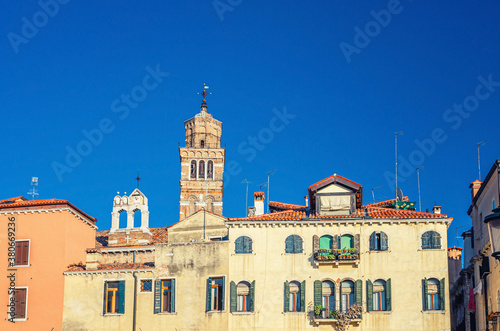 Campo Santo Stefano square with typical italian buildings of Venetian architecture and Santo Stefano Bell Tower in Venice historical city centre San Marco sestiere, Veneto region, Northern Italy