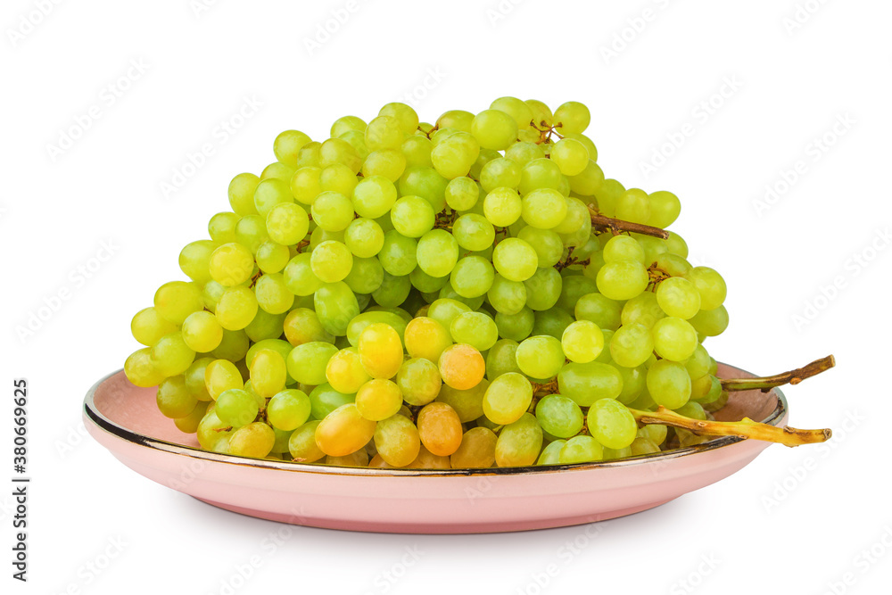Green grapes in a pink plate isolated on a white background. Kish-mish.