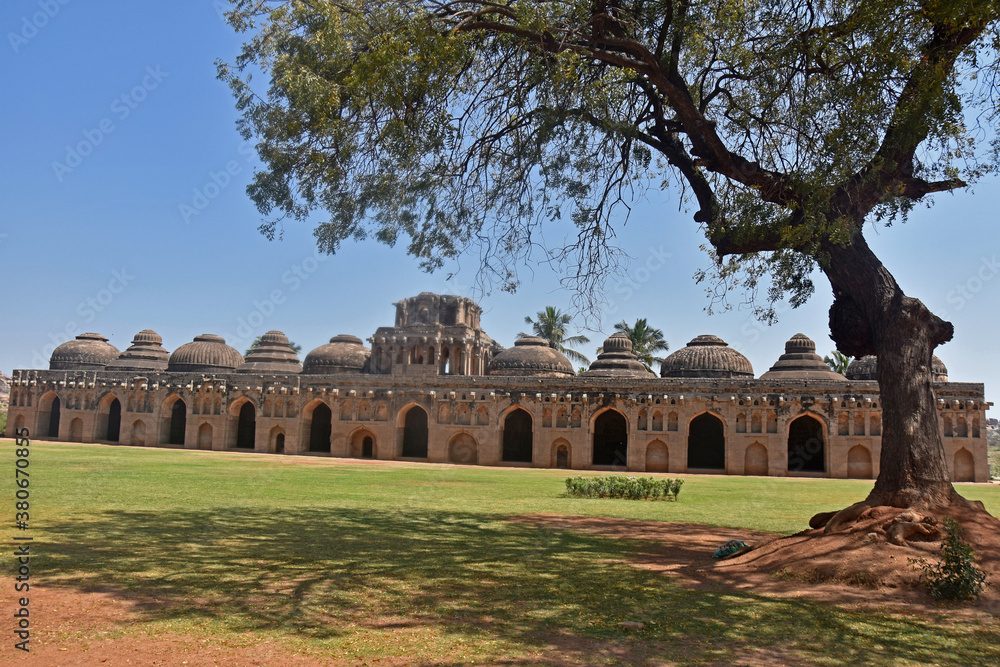 Ancient ruins of the Royal Elephant Stables at Hampi from 14th century Vijayanagara kingdom. The ancient city of Vijayanagara, Hampi, Karnataka, India.