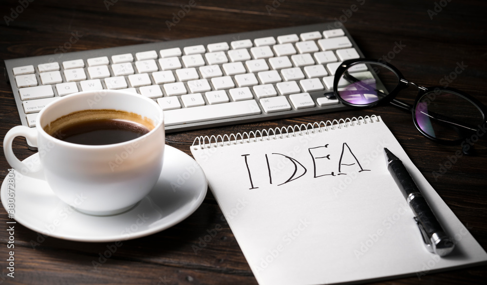 Open A Blank White Notebook, Pen And Coffee On The Desk Open A Blank White Notebook, Pen And Coffee On The Desk