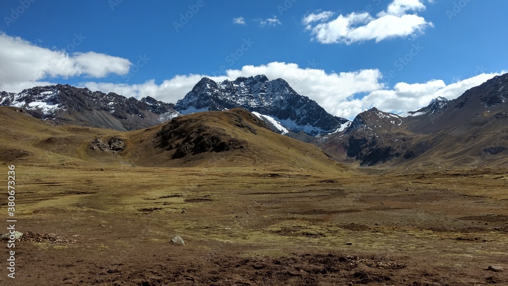 landscape in the mountains with snow winicunca peru south america