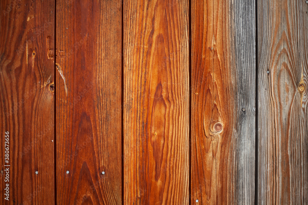 The texture of the boards. Background from tarry boards. The texture of the boards. Background from tarry boards.