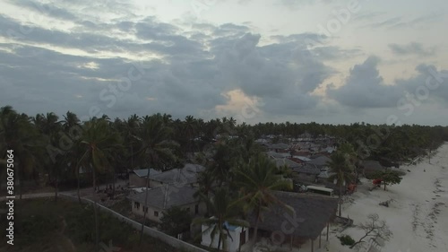 Aerial view of tropical vegetation and Pingwe beach village at Sunset in Zanzibar, Tanzania photo