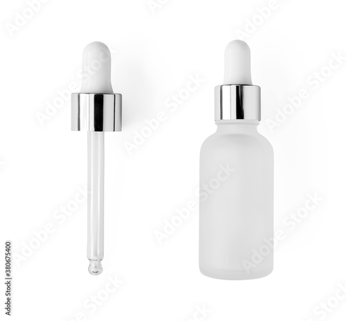 Serum bottle with pipette isolated on white background, top view. Close-up frosted glass container for skin care beauty product, above..Aromatherapy, essence or perfume blank photo