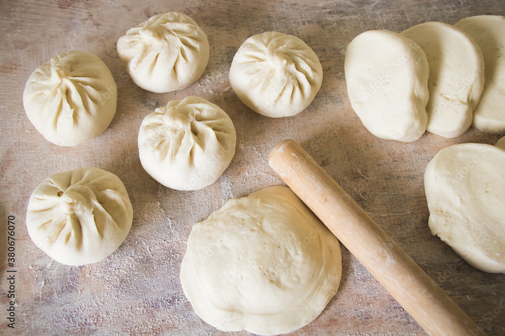 Image of making process of Chinese traditional food - baozi ( Chinese steamed buns ) Image of making process of Chinese traditional food - baozi ( Chinese steamed buns )