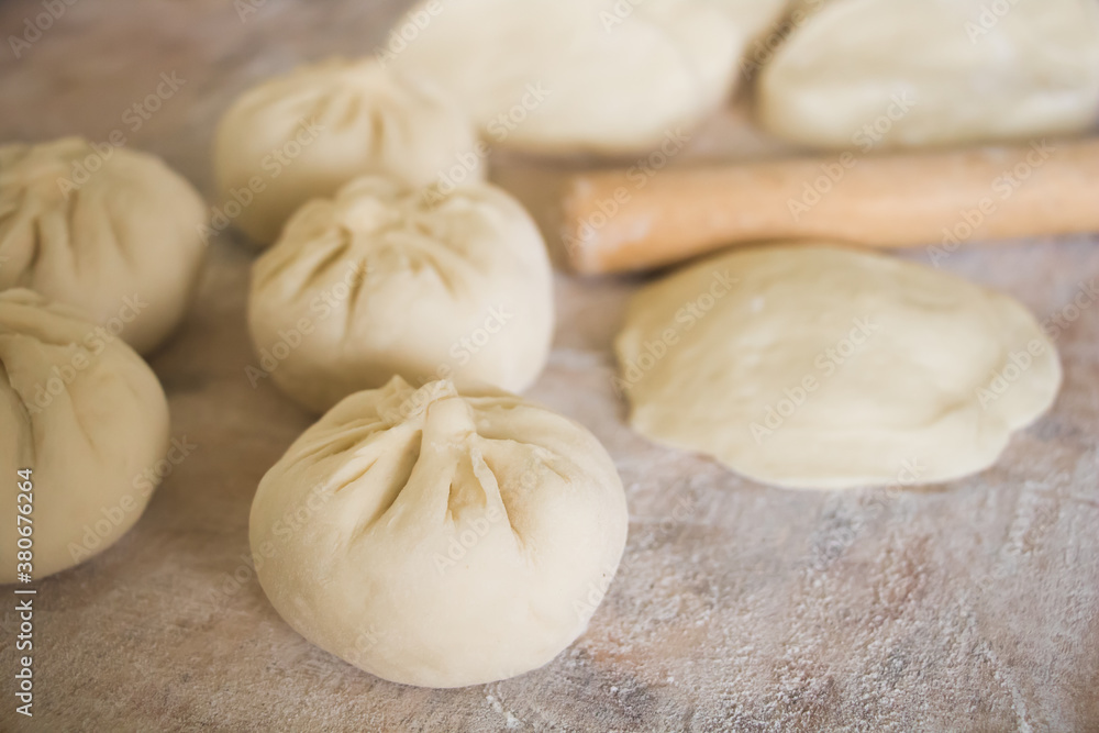 Image of making process of Chinese traditional food - baozi ( Chinese steamed buns )