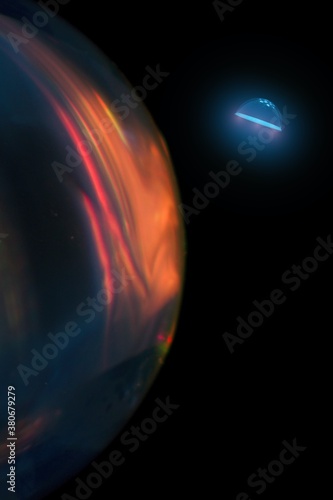 Fototapeta Naklejka Na Ścianę i Meble -  A flying saucer or UFO lands on a new unknown planet. Space concept.Aliens have discovered a new planet during space exploration.