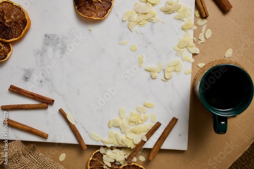Christmas holiday baking flat lay with ingredients and a cup of hot glugwein.