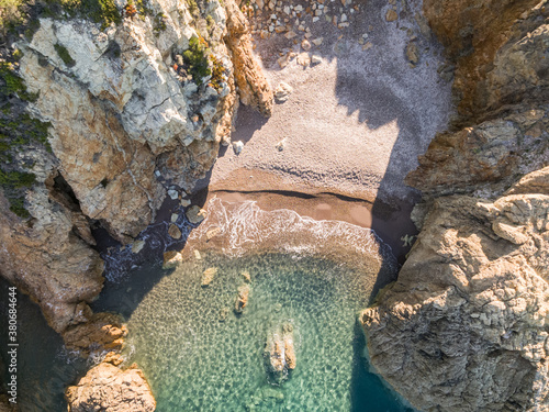 Obraz na plátně Bird's eye view of secluded sandy cove in Corsica