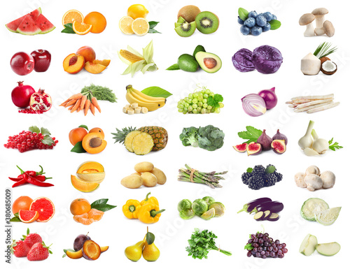 Assortment of organic fresh fruits and vegetables on white background