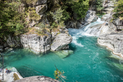 The Potholes of the Giants in the Toce River with green water and waterfall in Uriezzo photo