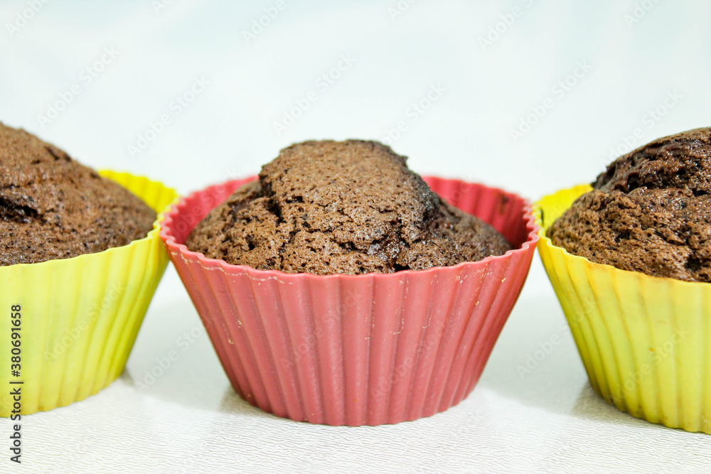 Baked muffins on a white table.Close -up Baked muffins on a white table.Close -up