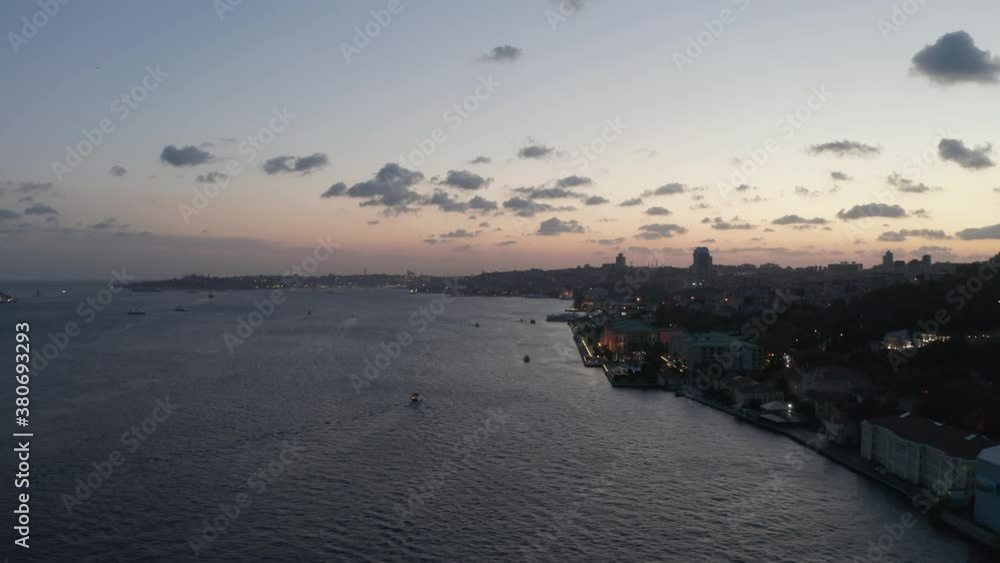 Wide view over Bosphorus at Dusk with Orange Colored Sky, Aerial View Wide view over Bosphorus at Dusk with Orange Colored Sky, Aerial View