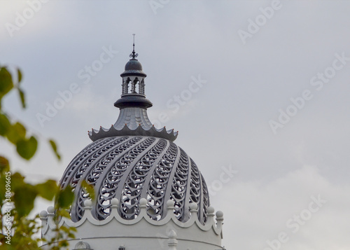 Kazan, Russia, September 16, 2020. Openwork dome of the modern ministry of agriculture - the palace of farmers against a cloudy sky photo