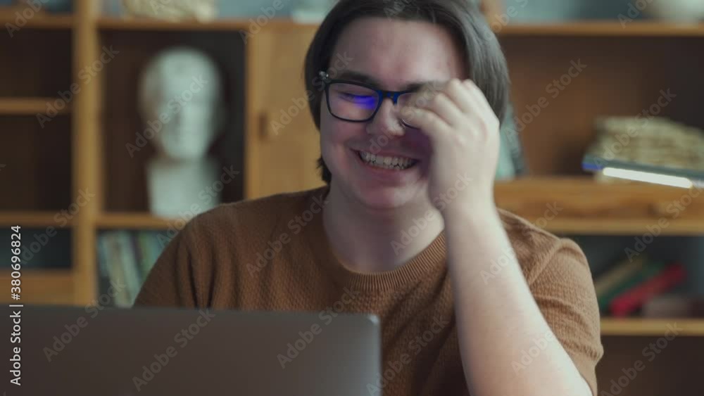Student studying or working at the computer with different emotions. Happy, joyful, cheerful, content Student studying or working at the computer with different emotions. Happy, joyful, cheerful, content