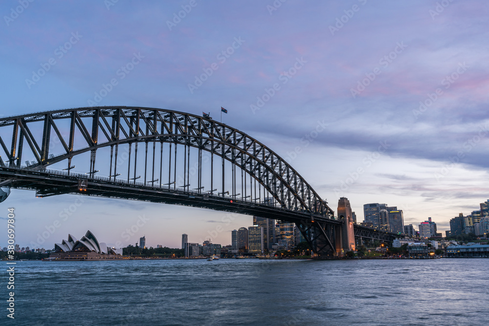 Sydney harbor bridge with Sydney CBD downtown skyline at sunset, Sydney, New South Wales, Australia