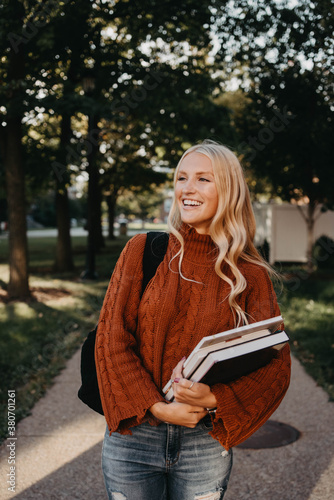 A young woman studying at a college campus