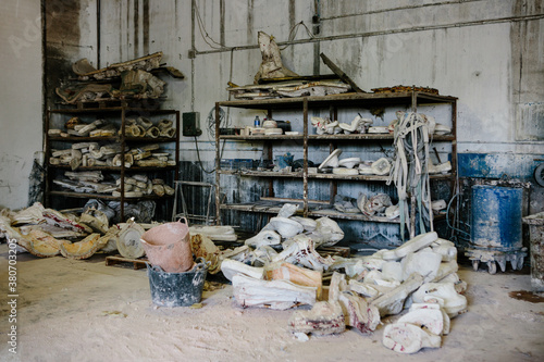 Old molds storage on shelves photo