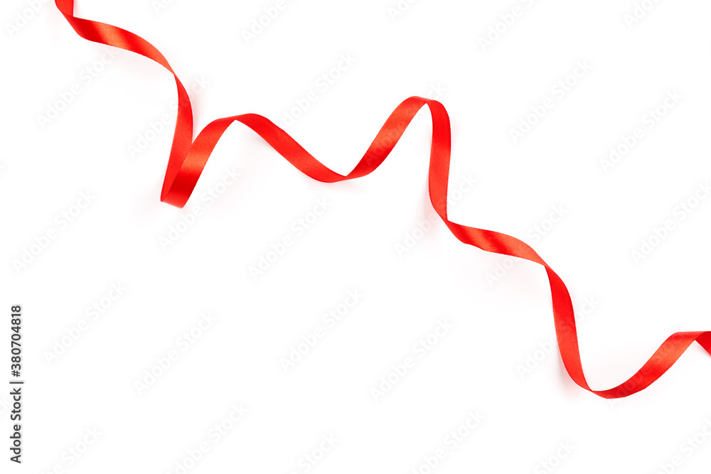 red satin ribbon with curls isolated on white background red satin ribbon with curls isolated on white background
