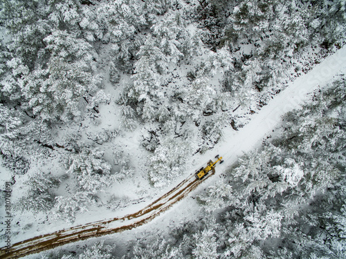 Motor grader used to open snowed in road