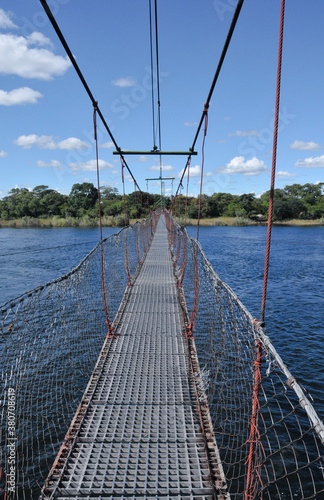 A hanging pedestrian bridge over the Zambezi River in Zambia