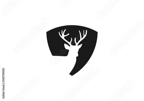 Deer logo with shield concept 