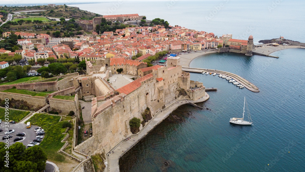Aerial view of the Royal Castle of Collioure in the South of France in the bay of La Baleta along the coast of the Mediterranean Sea in the Eastern Pyrenees