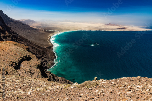 Vista a la playa famara desde el mirador del rio photo