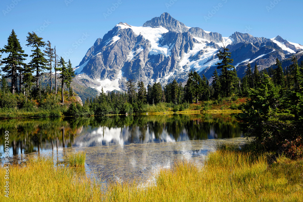 Mt. Shuksan and reflections in Picture Lake in autumn in Washington state
