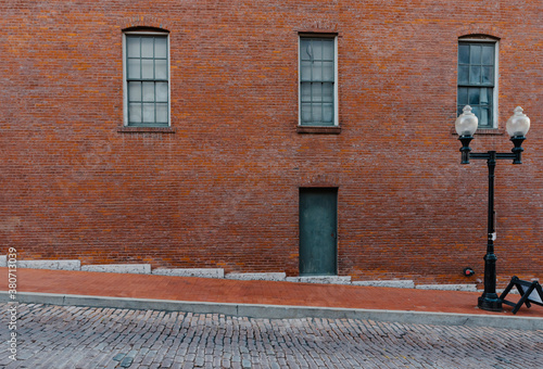 Old brick building and cobblestone street