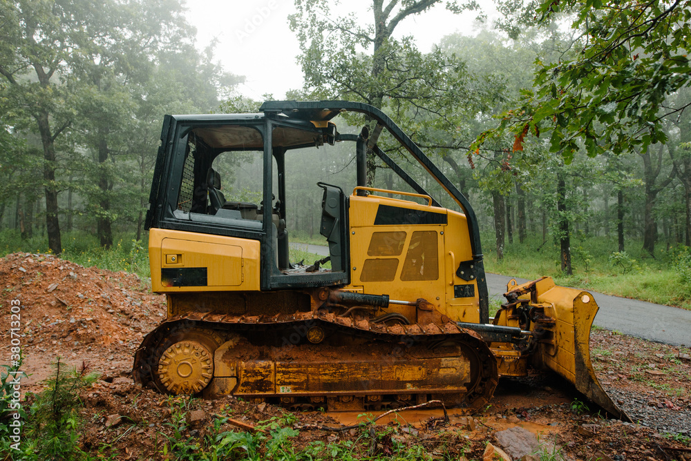 Buldozer in a misty forest Buldozer in a misty forest