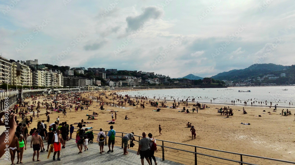 view of the beach with people.