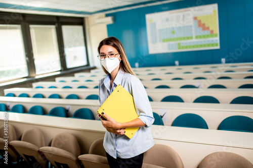 Female student wearing face...