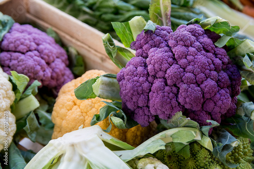 Colorful purple and yellow Cauliflowers in the market of Sartene ,Corsica, France photo
