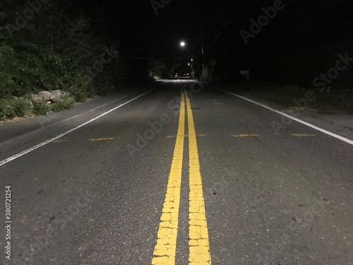 A creepy scary road at night 
