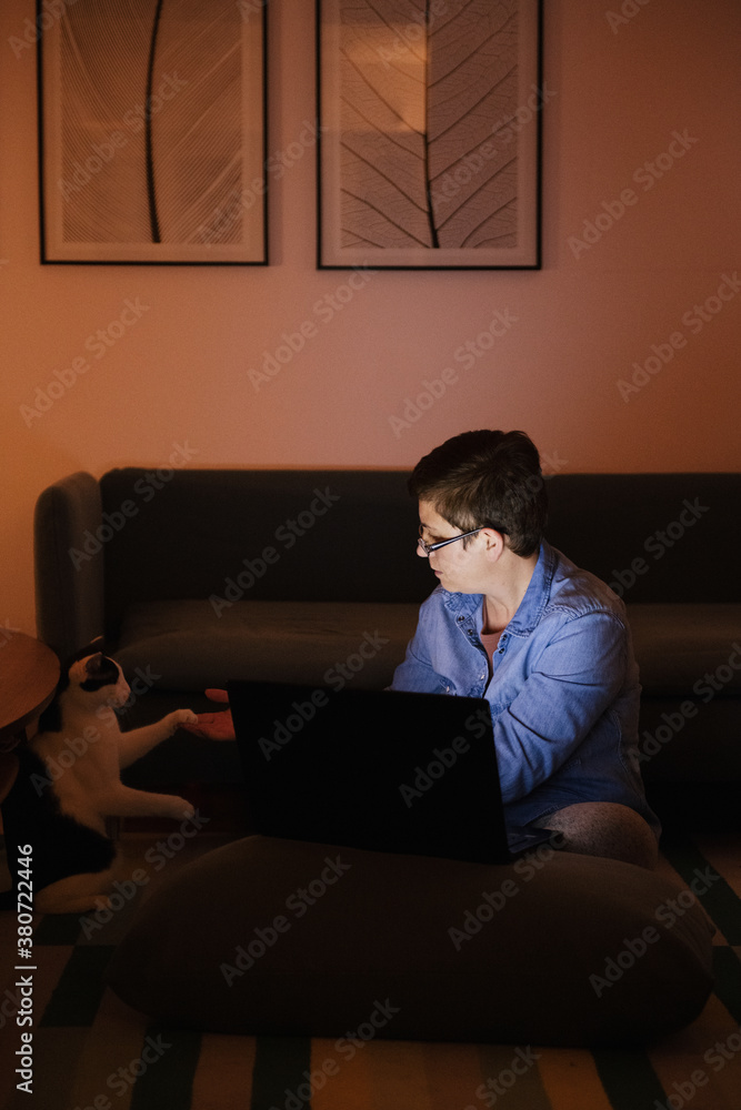 Woman working from home during the night Woman working from home during the night