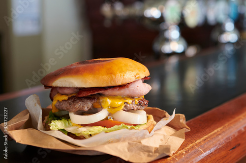 Gourmet burger in take away wrapper