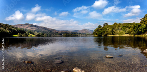 Panoramic view from the waters edge of Grasmere Lake in the Lake District, Cumbria, UK